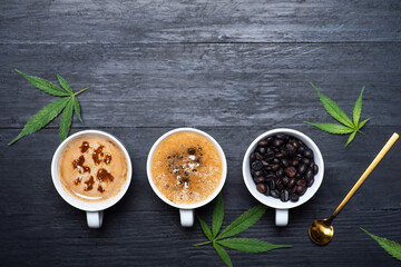 Cup of coffee with marijuana, roasted beans top view with