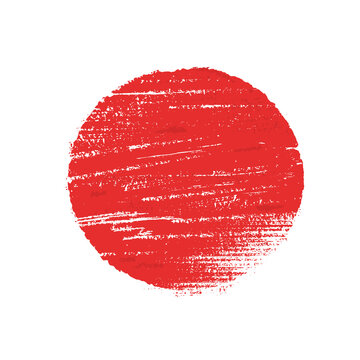 Japanese flag symbol of rising sun. Red circle in grunge style on white background.