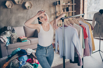 Portrait of her she nice attractive tired exhausted desperate girl organizing space casual assortment trend season wear living-room in modern loft brick industrial interior apartment flat