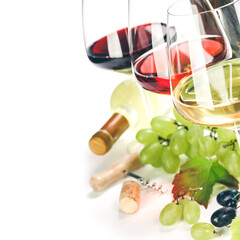 Glasses of white, red and rose wine and grapes