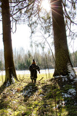 Obraz premium person walking in the woods