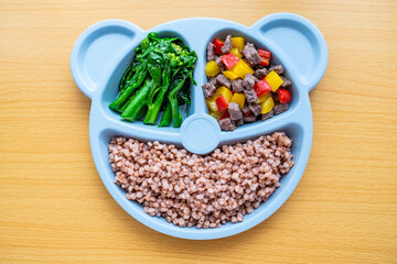 A plate of nutritional meals for children on the table
