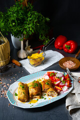 Vegetable roulade from roast  pork loins with salads