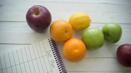Diet food and diet plan on wooden  background