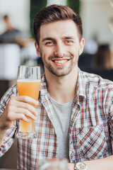 Fototapeta premium Young man testing beer