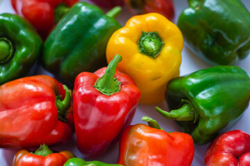 multicolored peppers on a white background