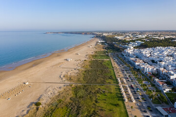 Los Bateles beach and Paseo Maritimo seen from above aerial view of Conil de la Frontera