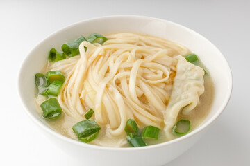 Dumpling Kalguksu on a white background