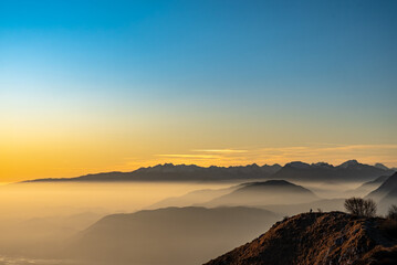 Obraz premium Winter sunset from an alpine peak of Friuli-Venezia Giulia