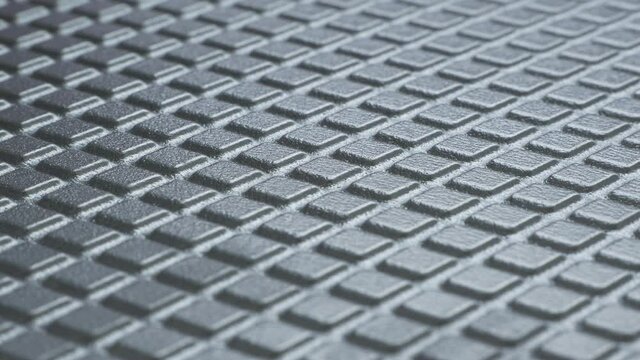 Die-cast aluminum. Metal surface. Square pattern. Smooth rotation