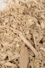 Detail of shredded chipboard . Recycling. Cradlle to cradle. Sustainability.