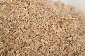 Detail of shredded chipboard . Recycling. Cradlle to cradle. Sustainability.