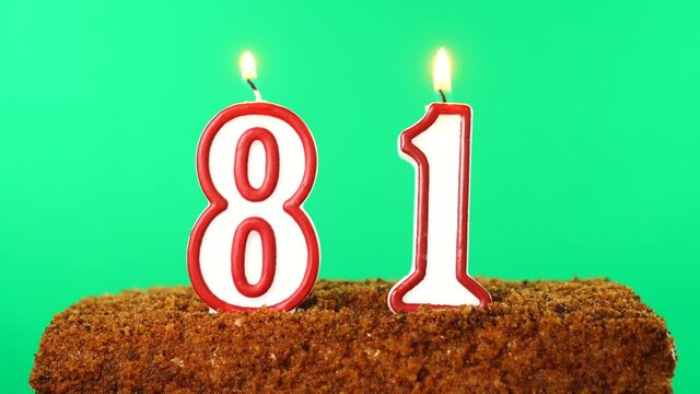 Cake with the number 81 lighted candle. Chroma key. Green Screen. Isolated