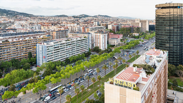 BARCELONA, SPAIN - APRIL 24, 2012: Above view of avenue Avinguda Diagonal in Barcelona city in spring evening. This is main street in city, it is about 50 meters wide and 11 kilometers long