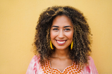 Happy multirace girl smiling on camera