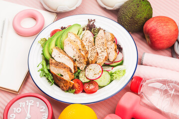 fitness and active healthy lifestyles Concept.A plate of chicken breast salad
