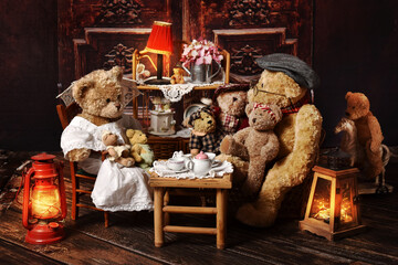 vintage teddy bear family sitting at the tea table