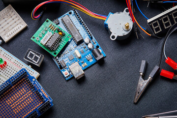electronic board and tools repairs on black background