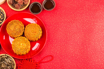 Obraz na płótnie Canvas Mid-Autumn Festival concept, Traditional mooncakes on table with teacup.