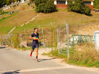 young man running on a race