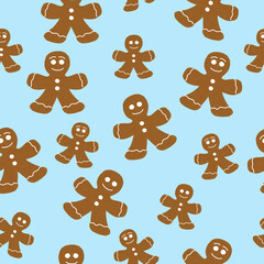 Christmas seamless pattern with family of gingerbread men on a blue background