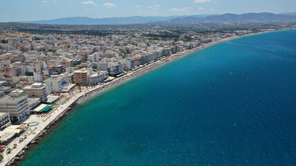 Fototapeta na wymiar Aerial drone photo of famous seaside area, organised beach and bay of Loutraki town, Corinthian bay, Greece