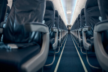 Commercial seat rows in an airplane cabin