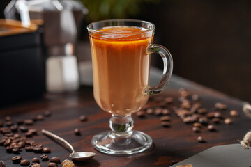 Iced coffee in glass with cream