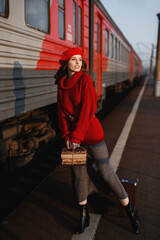 Girl at the station waiting for the train