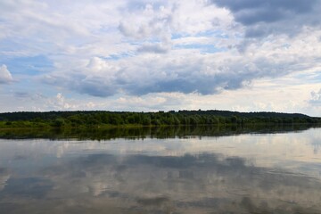 A beautiful view of the peaceful Vistula river. Summer day at the river Vistula, Kazimierz Dolny, Poland. The longest and largest river in Poland