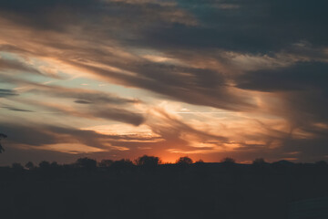 Obraz premium Orange clouds during sunset