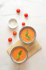 Fototapeta na wymiar Tomato gazpacho soup with fresh cucumbers