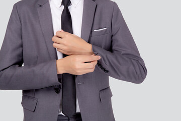 Closeup young asian businessman in suit smiling with confident and friendly isolated on white background, business man smart with success, manager or executive with handsome and leadership.
