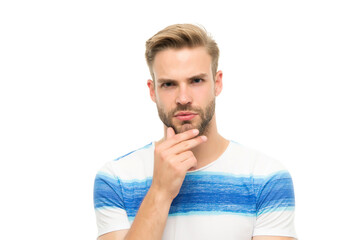 casual styled man with unshaven face and groomed hair thinking about something isolated on white...