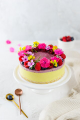 Raspberry lemon cake decorated with flowers. Sugar, lactose, gluten free. Healthy food, no baking.