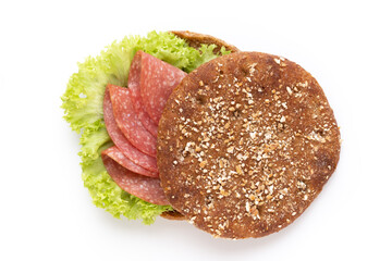 Sandwich with salami sausage on white background.