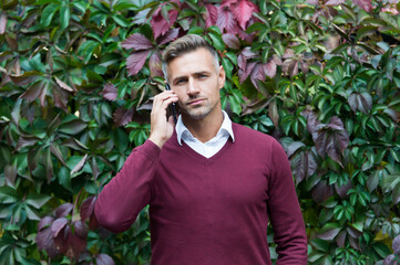 sexy man with bristle speak on phone, conversation