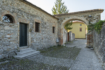 Fototapeta na wymiar ancient entrance gate to the medieval rural village of Strassoldo