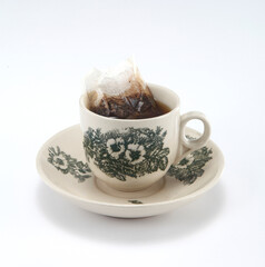 Kopi is a type of traditional coffee local to Singapore and Malaysia. It is a highly caffeinated black coffee served with milk and sugar.