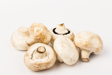 Fresh Champignon mushroom, isolated on white background. Close-up