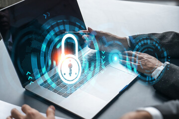 Man and woman working together on securitization of information of project. Blue icon infographic lock hologram. Concept of datum safety. Double exposure.