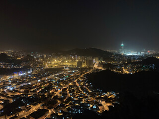 View of Makkah from Jabal Al-Noor, Cave of Hira at night time. Makkah Clock towers landscape background