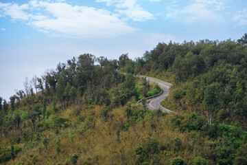 Road in the mountains and blue sky., The road to freedom.