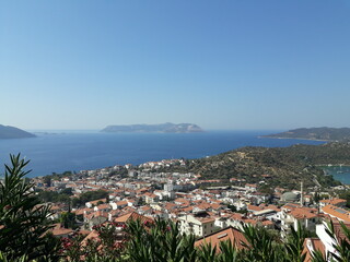 Obraz premium Beautiful aerial view of Kastellorizo Island of Greece with lots of roof and sea