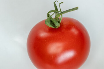 Close up of a ripe and beautiful red tomato