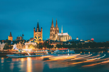 Great St. Martin Church And Dom In Cologne At Evening With Reflection In River Rhine, Germany