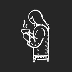 Girl with hot drink in mug chalk white icon on black background. Calm atmosphere enjoying. Woman in cozy sweater. Hyggelig lifestyle. Winter warm drink. Isolated vector chalkboard illustration