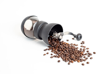 coffee grinder with coffee beans on white background
