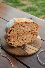 loaf of bread on wooden table