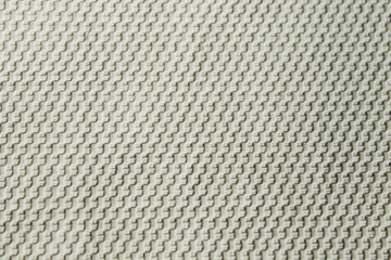 White rug for bathroom and toilet. Carpet texture with white overlock.